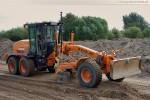 Gleisanbindung JadeWeserPort: Grader New Holland F156.6 A mit Topcon TM-1