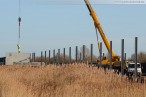 JadeWeserPort: Montage der Beton-Lärmschutzwand im Voslapper Groden